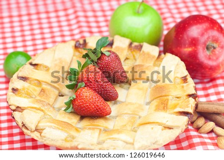 apple pie, apple, lime, cinnamon and strawberry on plaid fabric