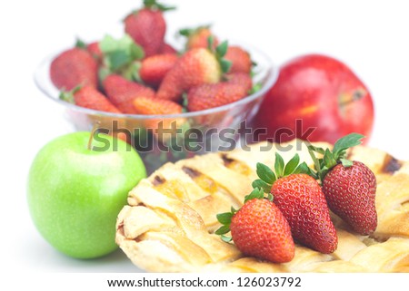 apple pie, apples and strawberries isolated on white