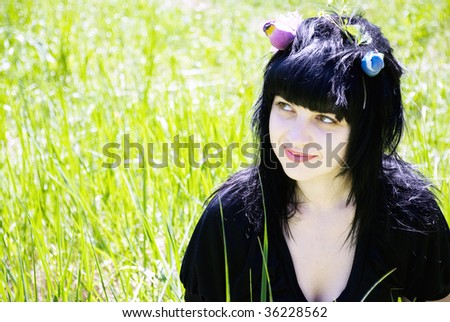beautiful young woman with a makeshift nest on his head