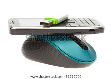 mountain out of a computer mouse, cell phone and flash card isolated on white
