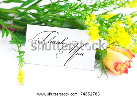yellow red rose ,yellow field  flower and a card  with the words thank you isolated on white