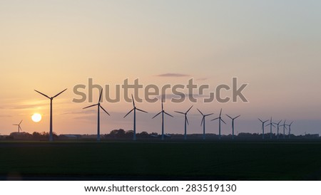 Windmills in sunset Netherlands