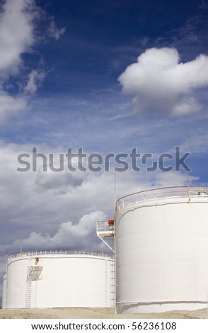 Oil reservoirs in desert. Wide angle