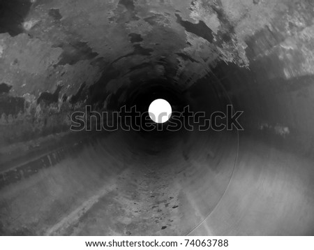 Rust the underground tunnel. Inside of gas pipeline. Black and white photo