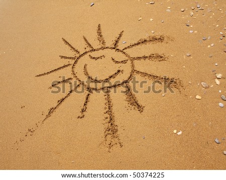 On damp yellow sand the smiling sun is drawn