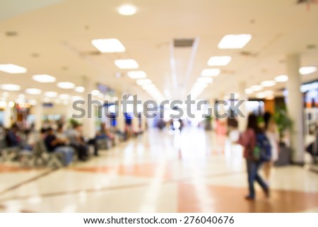 Blurred image of lifestyle at waiting chair zone in airport with bokeh for background usage