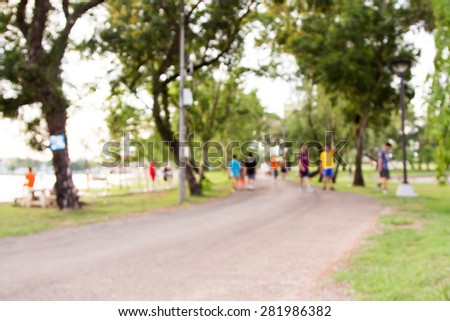 blurred photo of people lifestyle at public park for background usage
