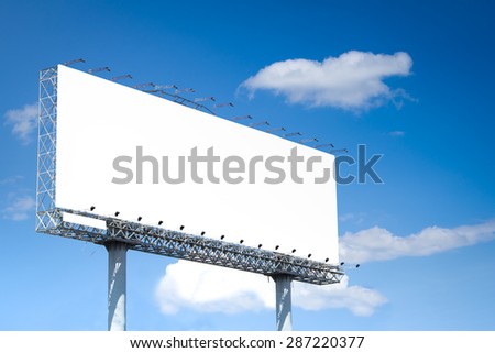 Blank billboard on blue sky on day time for advertisement