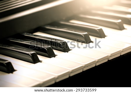 Black and white piano keys in vintage color tone,music concept