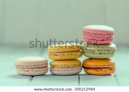 Sweet and colorful french macaroons in vintage color tone