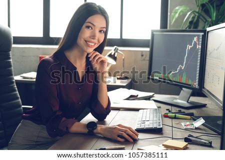 Boss woman is working with computer, working finance trading stock