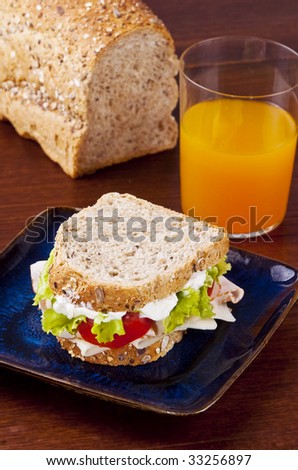 Turkey sandwich with lettuce and tomato