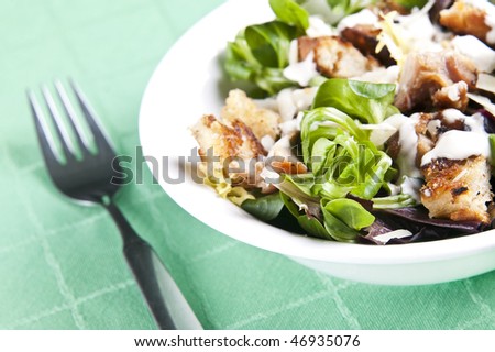 Delicious chicken caesar salad with tasty dressing