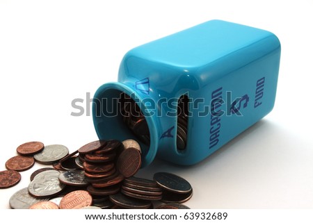 Vacation Fund A vacation savings jar with money. Horizontal.