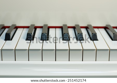 white piano with black and white keys