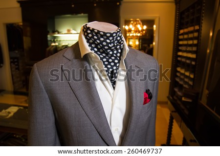 showcase with business mens suit