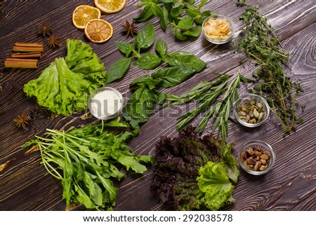 Food and cuisine ingredients. Colorful natural additives. Spices and herbs on wooden table.