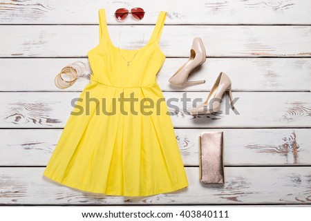 Summer women\'s clothes for a party. Set of summer clothes.