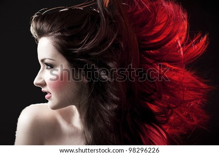 A beautiful woman with crazy hair