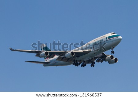HANEDA TOKYO, JAPAN - MARCH 15, 2013 - Cathay Pacific Boeing  747-400 B-HUEtakes off from Haneda Airport on March 15, 2013. Honk Kong is a major tourist desination for Japanese.