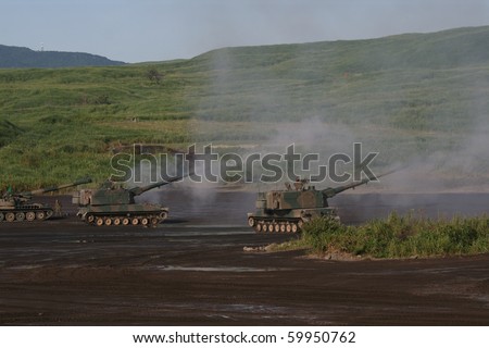 SHIZUOKA, JAPAN - AUGUST 28: Japanese Self Defense Force Type 75 155 mm Self-propelled howitzers during the Fire Power display near Mount Fuji August 28 2010 in Shizuoka, Japan.