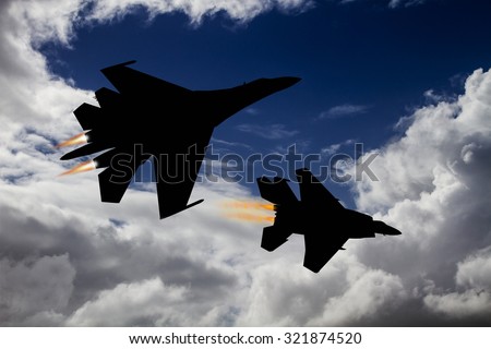 Silhouette of a dog fight between 2 modern jet fighters. American vs Russian made aircraft. (Computer Illustration)