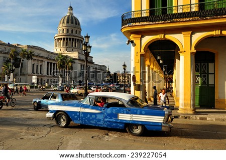 HAVANA, CUBA - DECEMBER 15 2014: Cubans walking normally in the center of Havana, after the US announced changes to its policy with Cuba