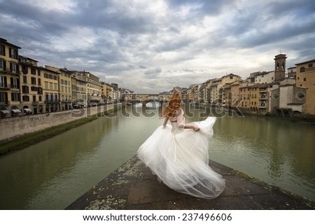 Bride in Florence. Ponte vecchio. Italy