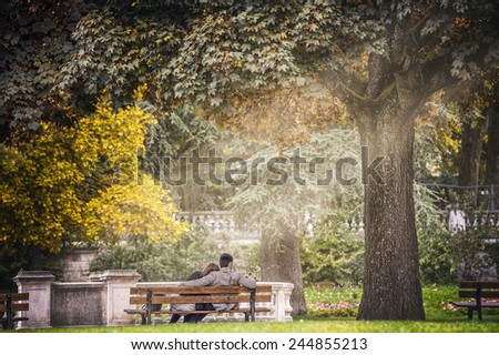 an autumn day in the park in paris.