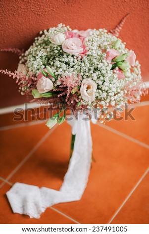 wedding bouquet with roses in creamy fine art style