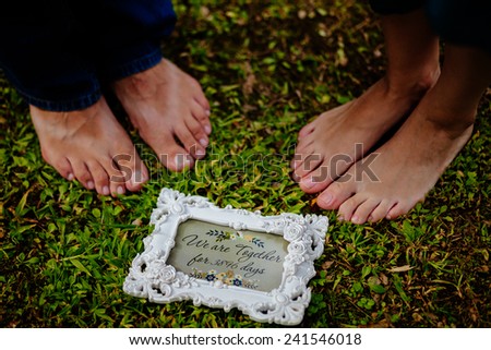 feet\'s close up of family couple together