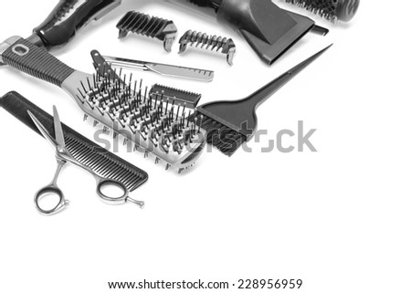 Hairdresser\'s accessories on a table in a diagonal shape. Nice for a personal card and adding a text area.