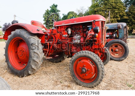 ROSÃ ,ITALY - JULY 05, 2015: Close up of an old tractor during a demonstration of old agricultural vehicles