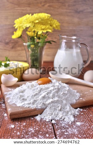 egg, milk, flour on the table