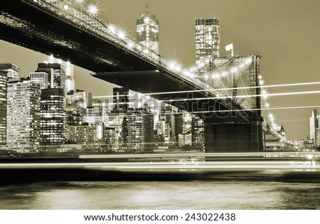 Brooklyn Bridge and Manhattan skyline at night.