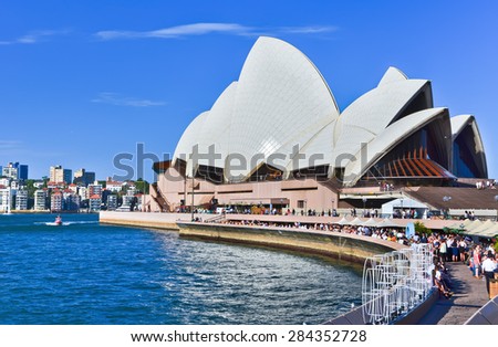 Sydney, Australia - January 23, 2015: Sydney Opera House in a sunny day on January 23, 2015 in Sydney, Australia. The Sydney Opera House is one of the most famous buildings in the world.
