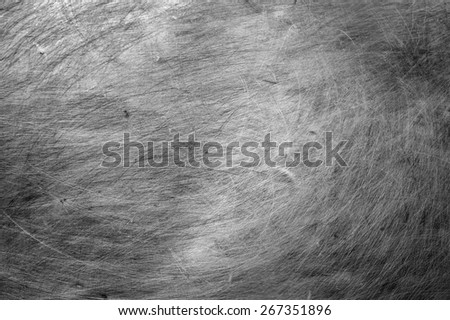 Old smooth metal background texture with scratches
