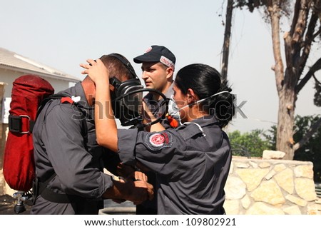 TIVON, ISRAEL - AUGUST 09: Forest fire breaks out in Kiryat Tivon. Rescue workers struggle to prevent further damage. Tivon, Israel August 09, 2012