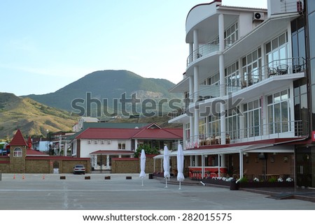 May 28, 2014, Koktebel, Crimea, Russia - Hotel on the beach, and nearby mountains