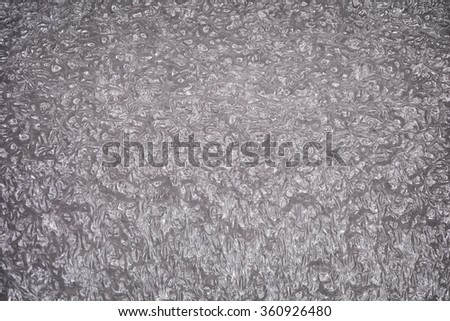 The macro transparent foam texture, foam plastic button background, texture of foam