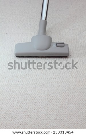 vacuum cleaner on a carpet