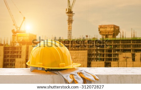 yellow hard hat on construction site