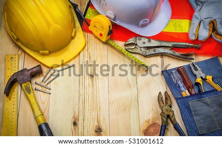 Construction tools on worker desk. Free space for text.
