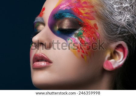 Beautiful creative makeup on fashion girl