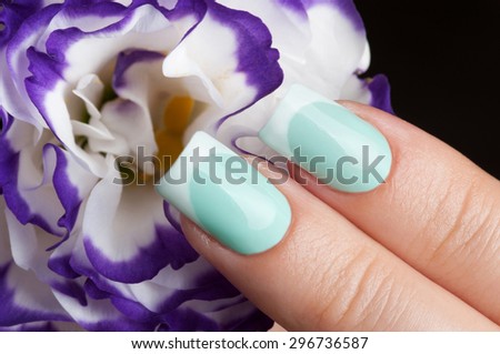 Close-up picture of beautiful nails girl. A good idea for the advertising of cosmetics for manicure. Great idea for advertising nail polish.