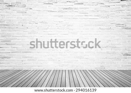 Old interior room with broken white brick wall and grunge wood floor texture in gray tone