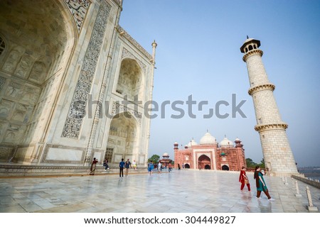 AGRA, INDIA - JULY 13, 2014 : Tourist visit Taj Mahal and Mosque on the West side near the Yamuna river, Taj Mahal is the famous place and landmark of India.
