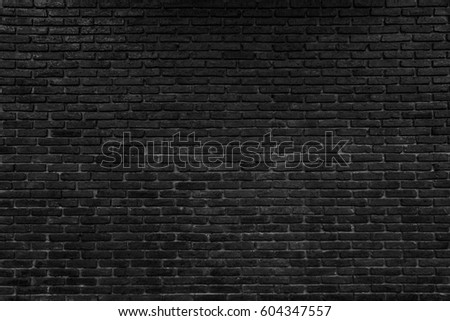 abstract black brick wall pattern background, rough solid texture and grunge surface backdrop for architecture material decoration or retro interior room concepts