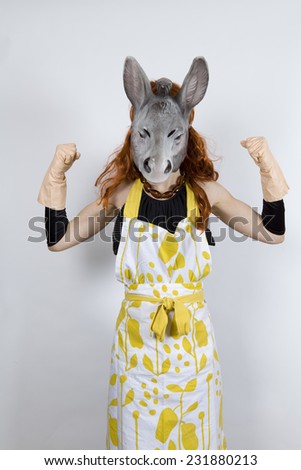 Donkey housewife wearing an apron over an evening dress and evening gloves and rubber gloves