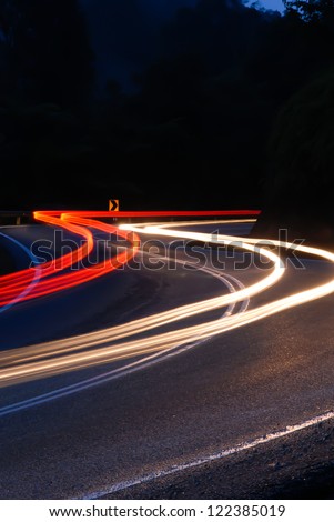 Lights from vehicles head light and tail light creating \'light trail\' when captured using slow shutter.